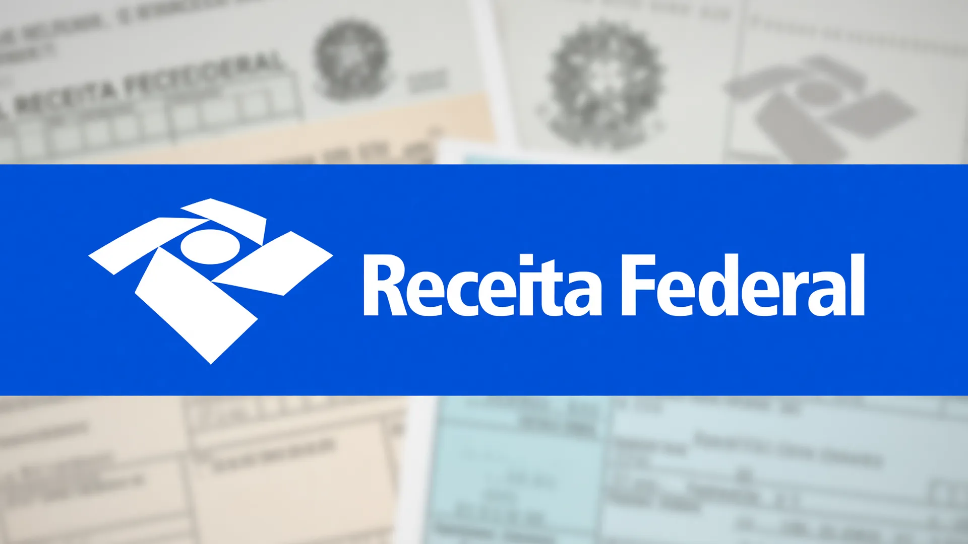 Brasão da Receita Federal em azul com fundo institucional destacando a declaração do Imposto de Renda 2026