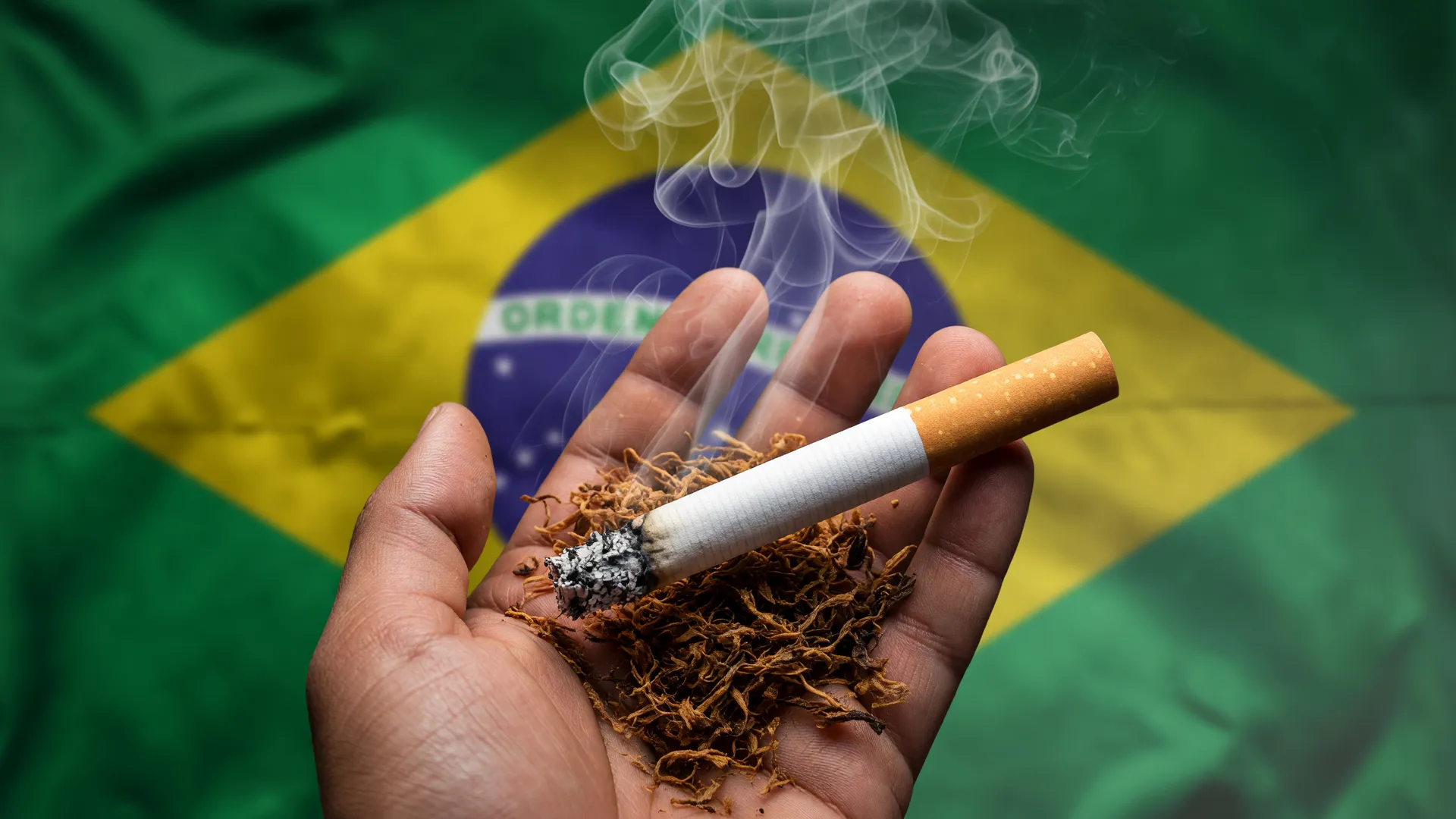 Indústria do tabaco e responsabilidade social marketing: fumaça de cigarro sobre bandeira do Brasil