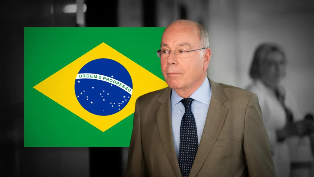 Chanceler Mauro Vieira em retrato oficial com bandeira brasileira ao fundo, representando Brasil contesta tarifas dos EUA
