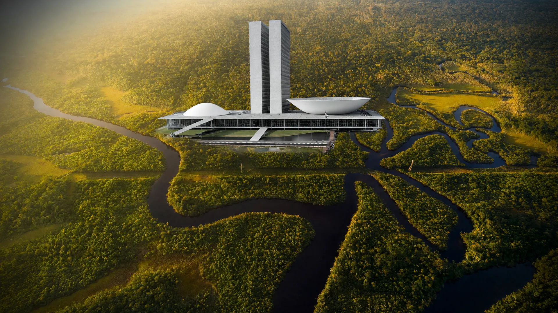 Floresta amazônica vista do alto com o Congresso ao fundo, simbolizando ameaças ao carbono nas unidades de conservação