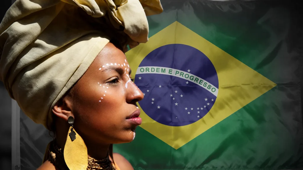 Mulher negra com turbante dourado e a bandeira do Brasil ilustram a concentração de renda no Brasil