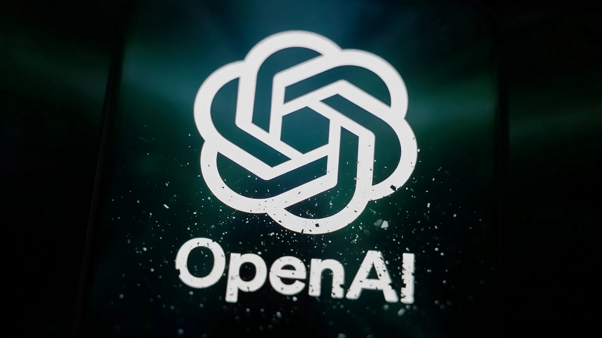 Logotipo OpenAI iluminado em fundo escuro, representando a perda do controle de agentes de IA