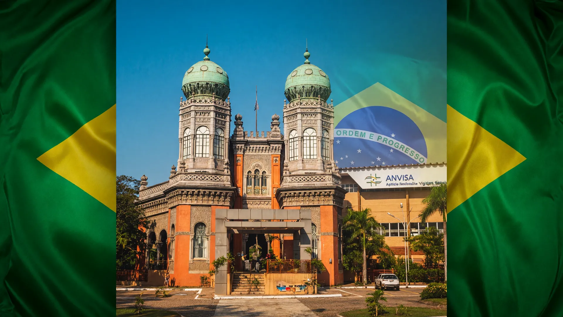 Castelo da Fiocruz em destaque com a sede da Anvisa ao fundo, símbolo da vacina de mRNA no Brasil