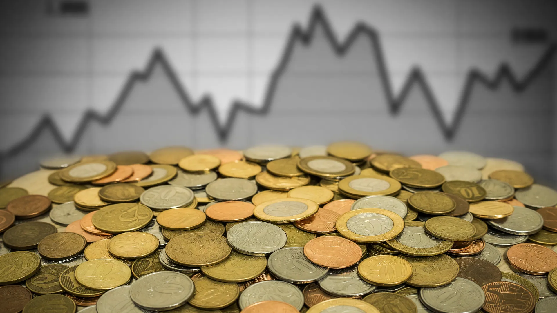 Moedas de real empilhadas simbolizam o Tesouro Direto suspende negociações juros após disparada dos títulos públicos